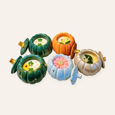 Pumpkin flower candle jars in green, orange, sky blue and champagne
