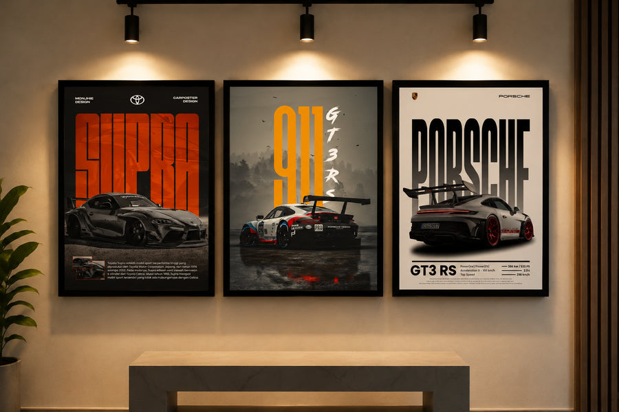 Framed car art hung on a gallery wall