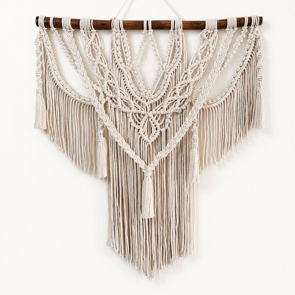 Macramé wall hanging styled in a boho living room